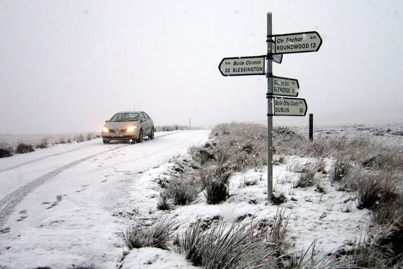Car on snowy road in Ireland