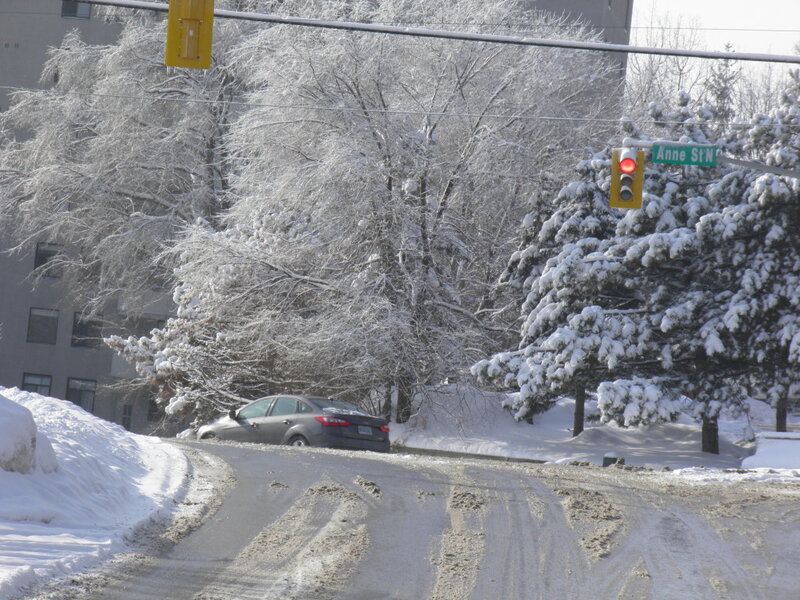 Car on Snowy Street