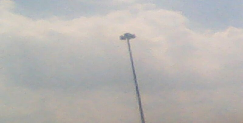 Car on Tall Pole