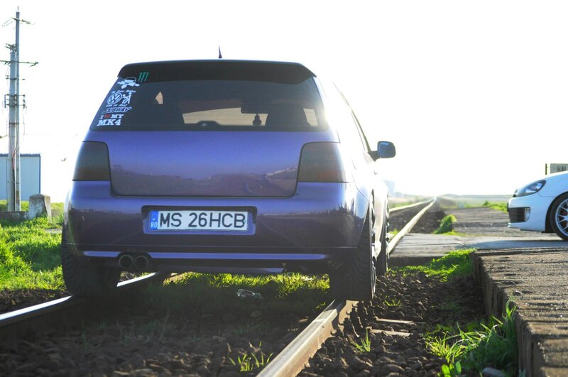 car on train tracks