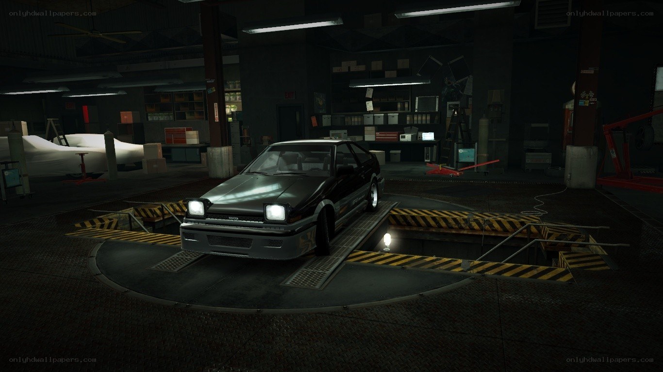 car on turntable in garage