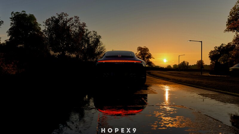 Car on Wet Road — Orange