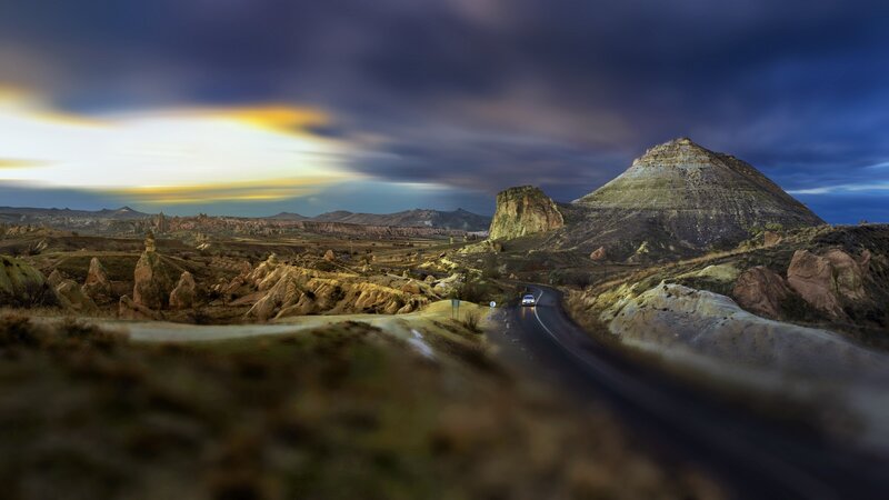 Car on Winding Road — Blue