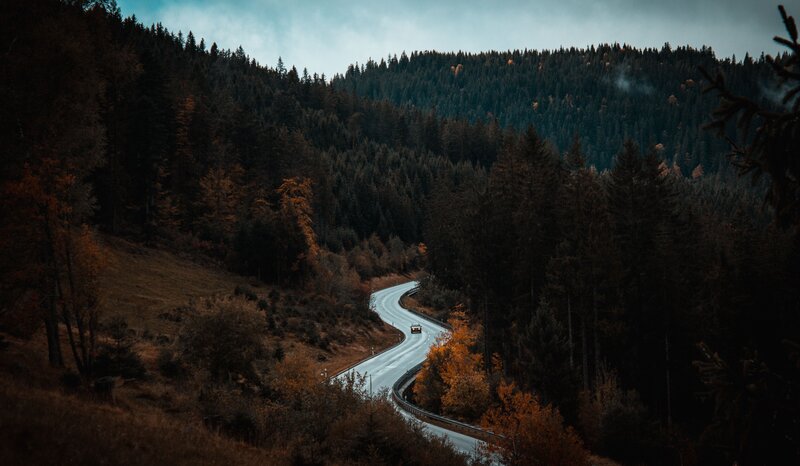 Car on Winding Road — Green, Dramatic, Autumn