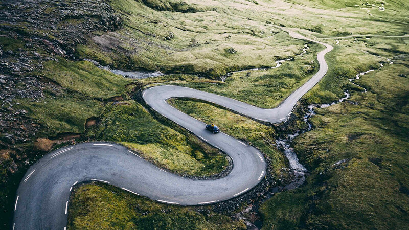 Car on Winding Road — Green, Serene, Afternoon, Photograph