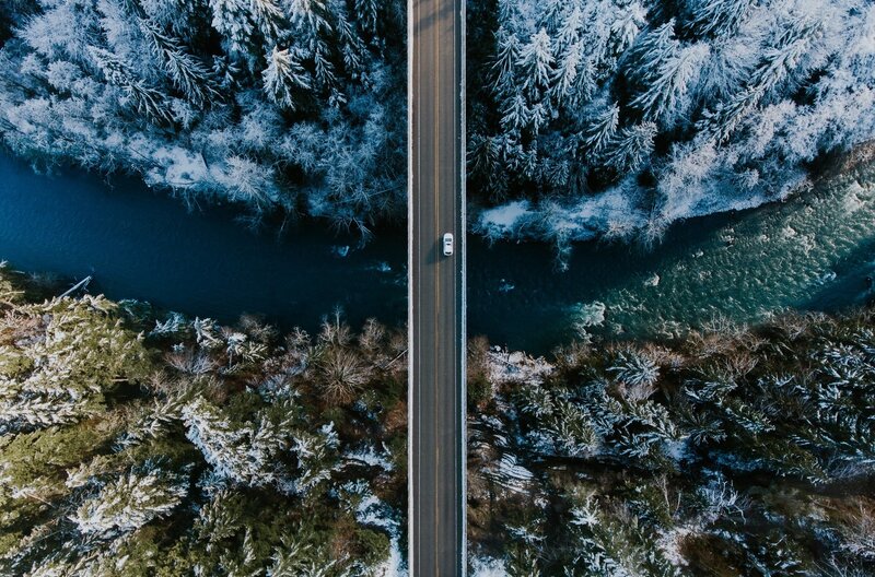 Car on Winter Bridge