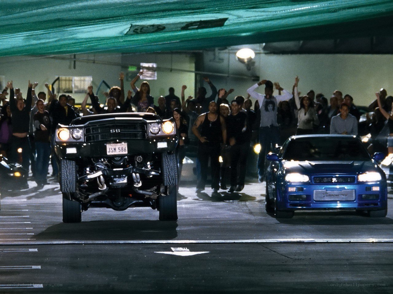 Car race in underground garage