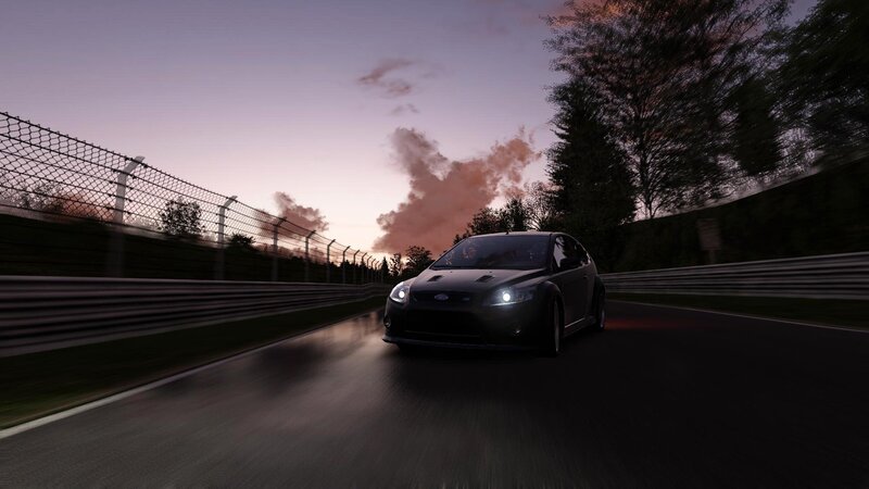 car racing at dusk