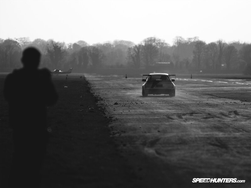 Car racing on a runway