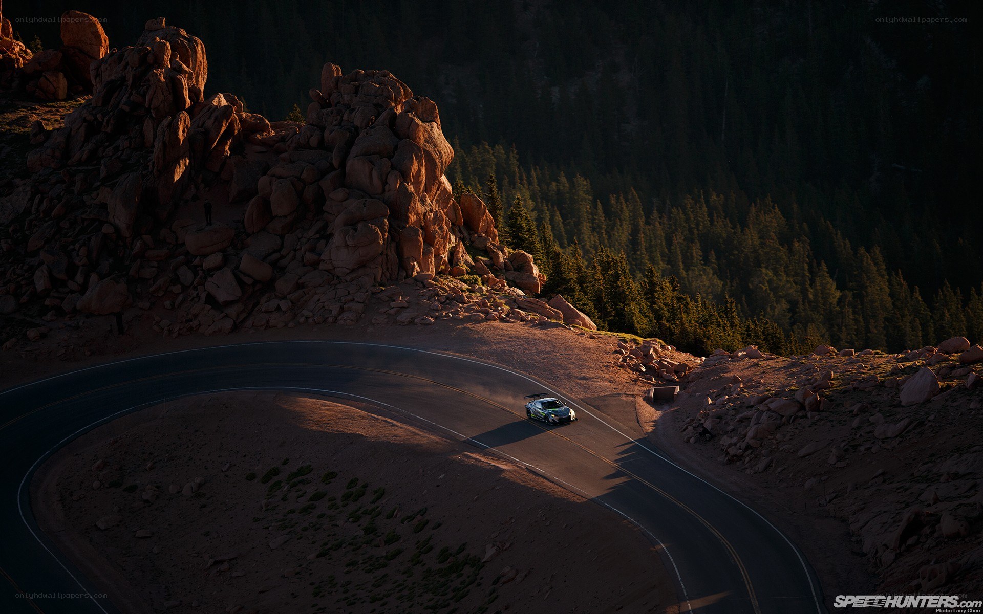 car racing on mountain road
