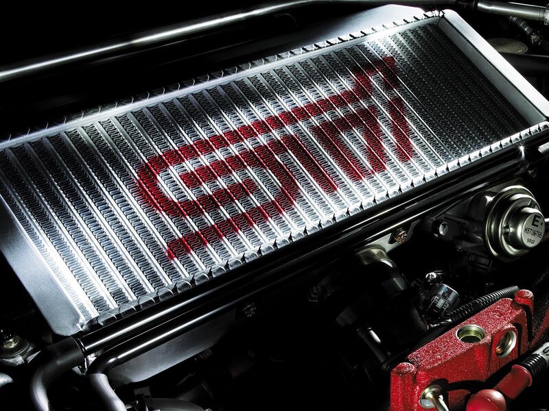 Car radiator with red coolant