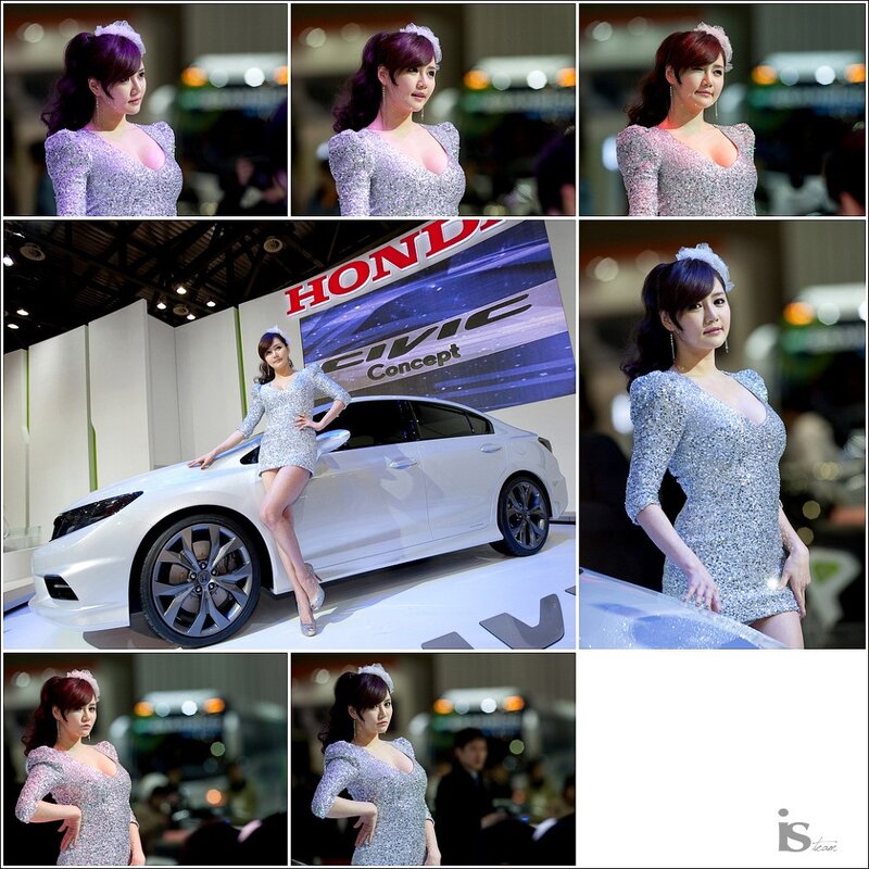 Car show model posing with Honda Civic