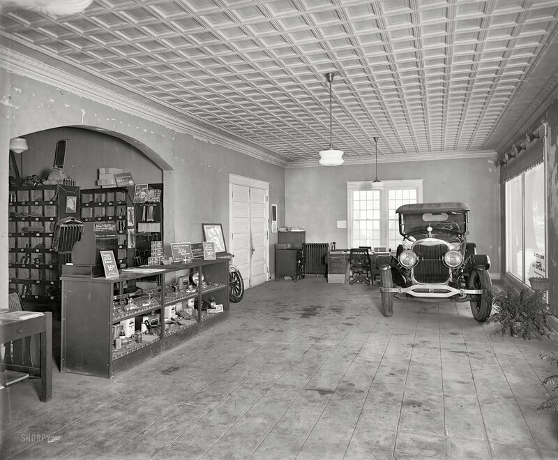 Car showroom with vintage vehicle