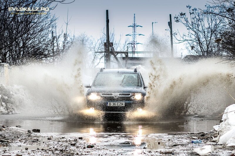 Car splashing through a puddle