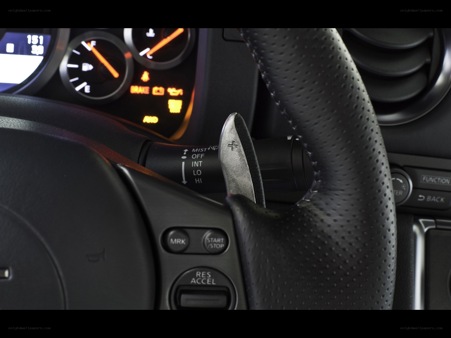 car steering wheel and dashboard