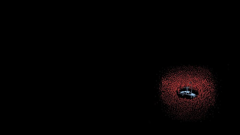 car surrounded by red figures