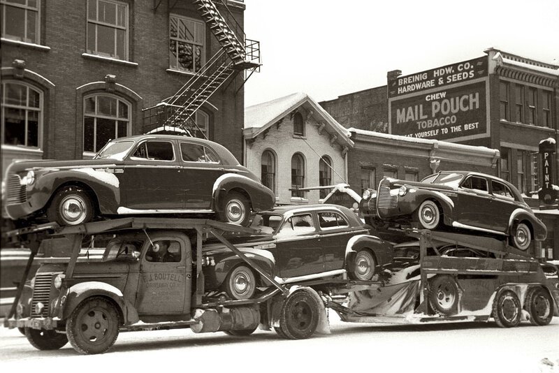 Car transport in snowy city