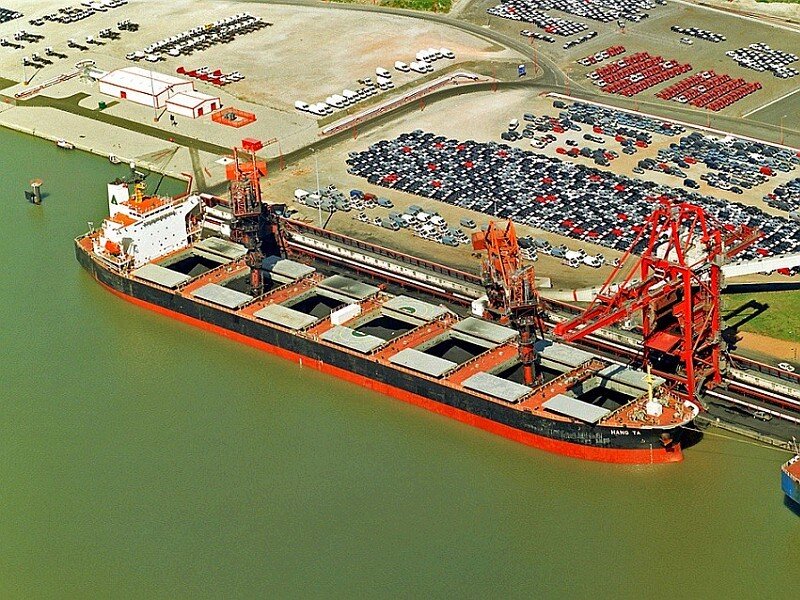 Car transport ship at port