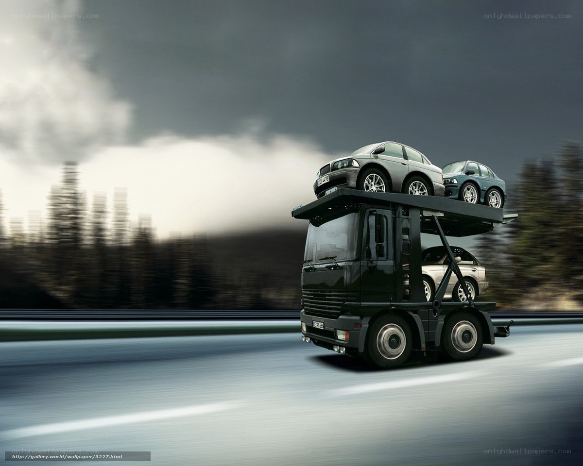 Car transport truck in motion