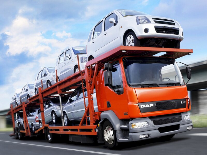 Car transport truck on highway