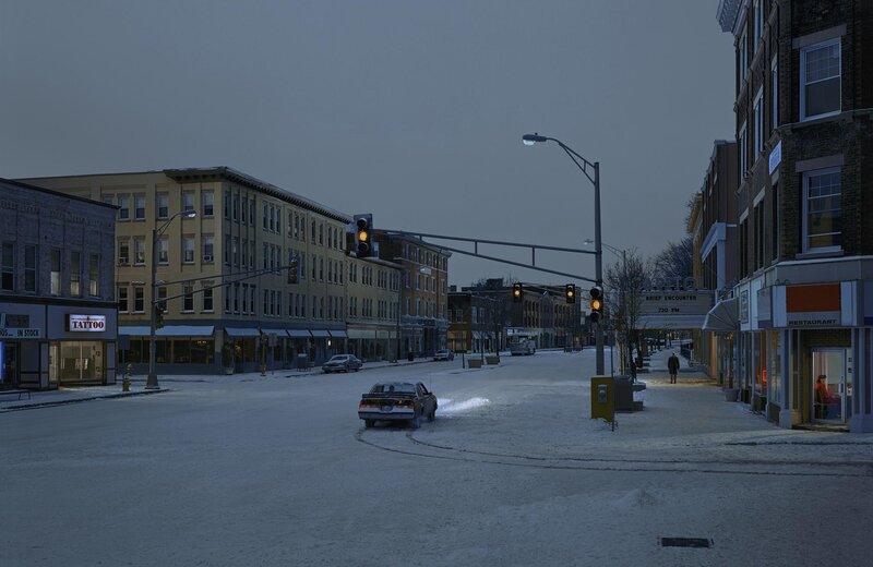 Car Turning on Snowy Street — Gray