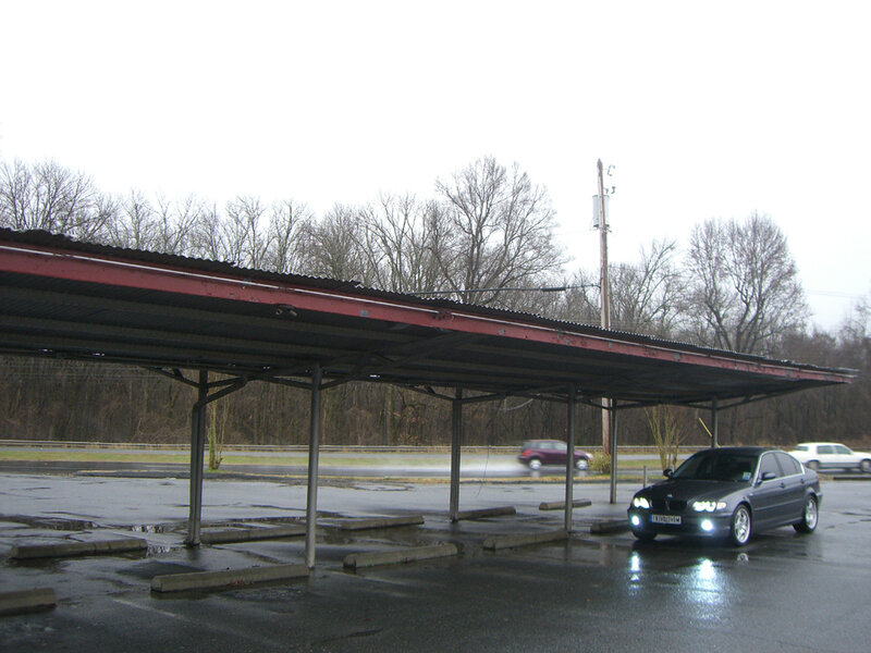 Car under a covered parking structure