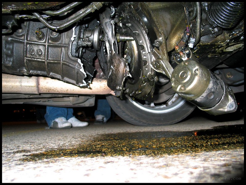 car undercarriage with fluid leak