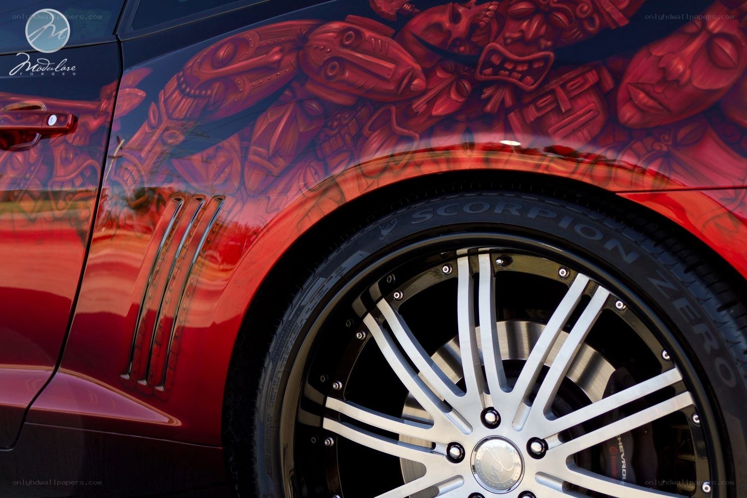 car with custom red artwork