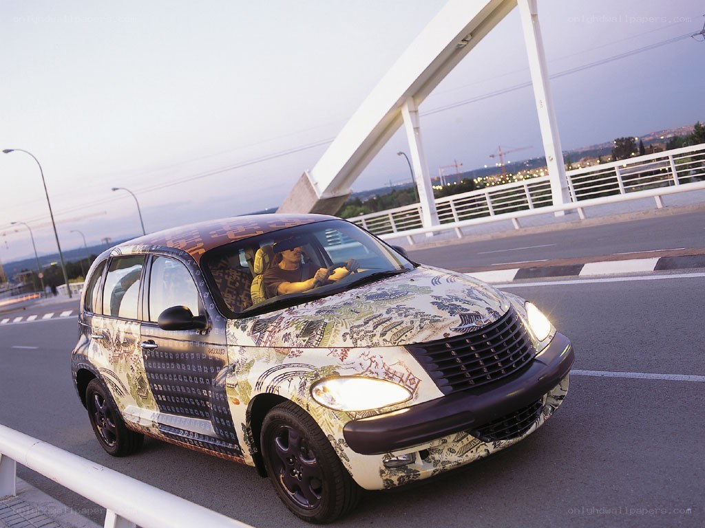 car with decorative wrap on bridge