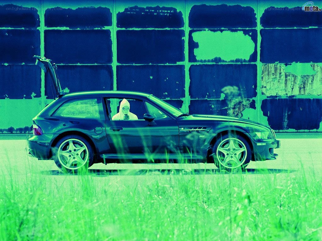 car with gas mask driver