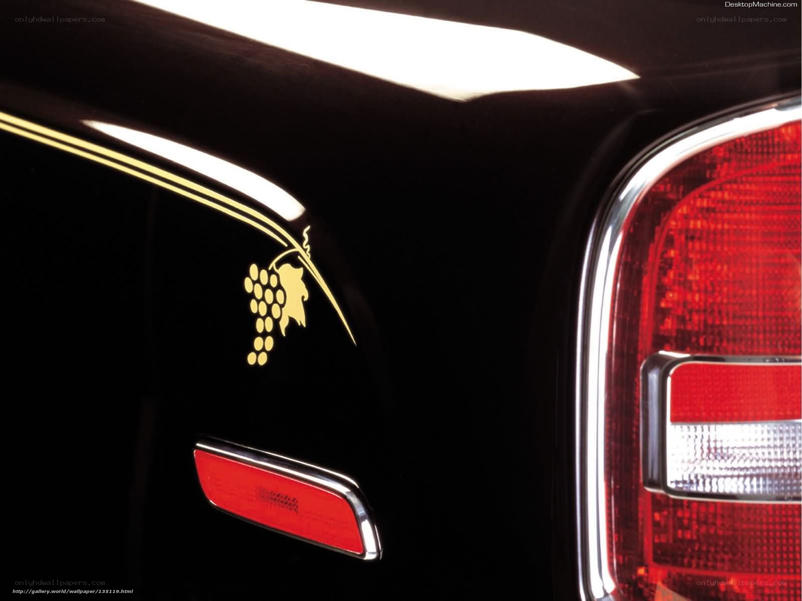 Car with grape emblem