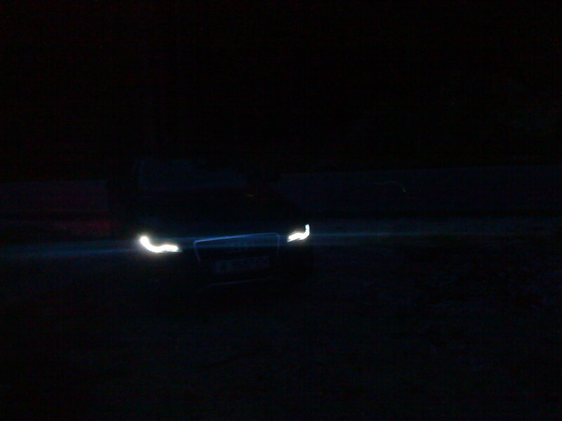 Car with Headlights on — Black, Dark