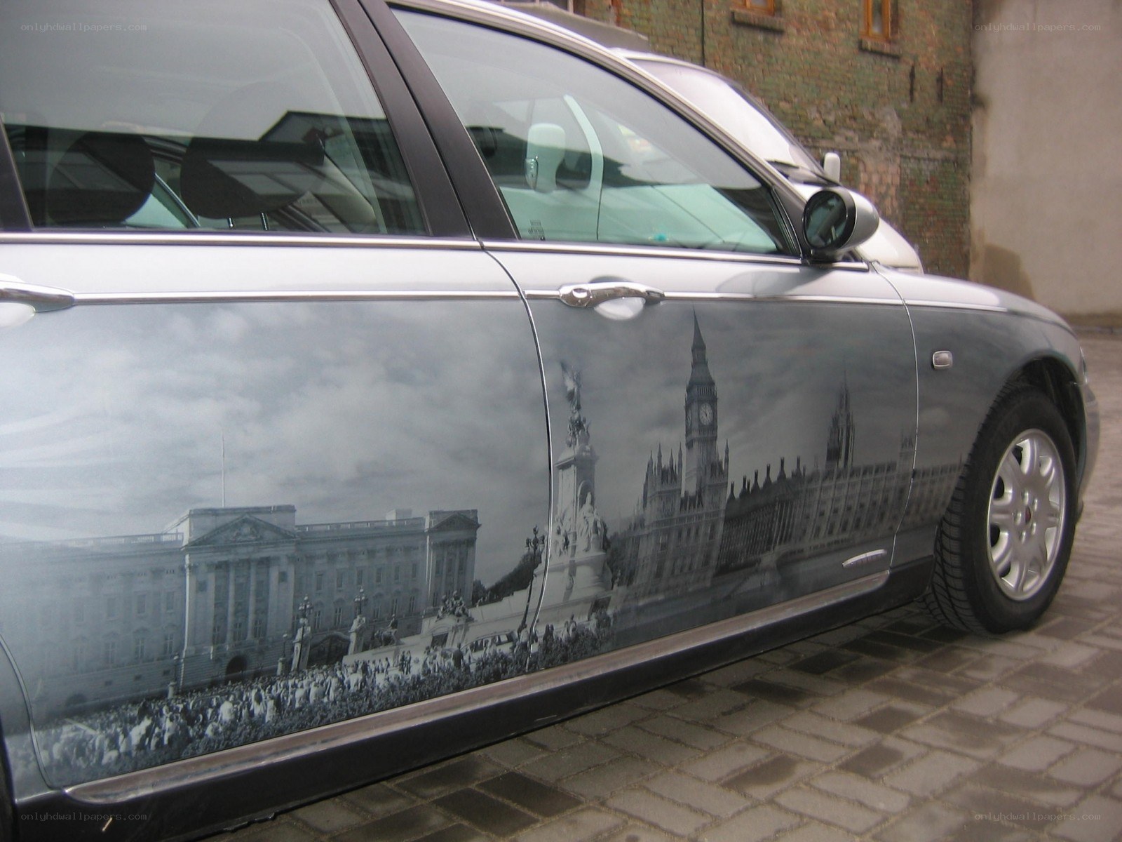 car with London scene wrap