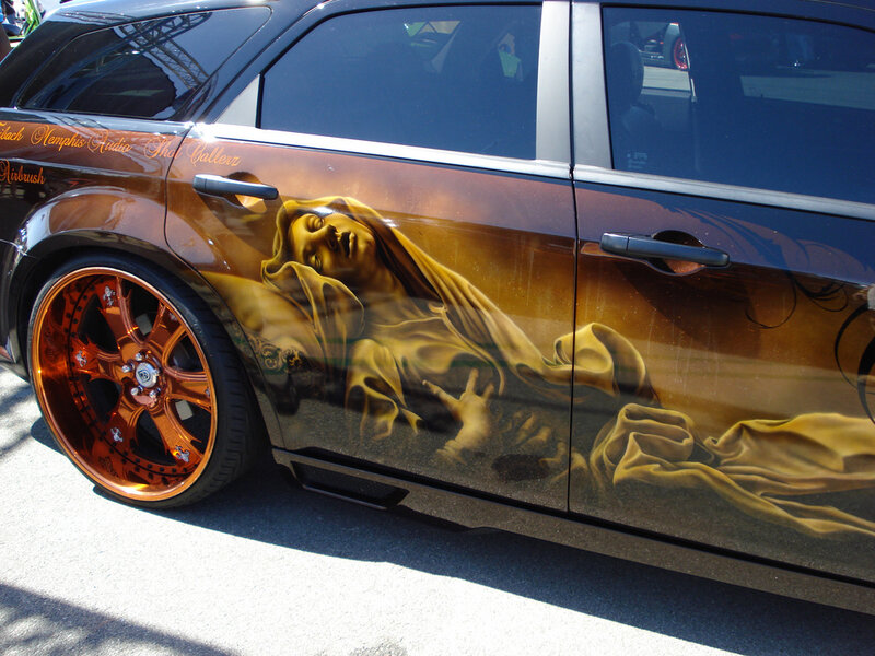car with religious airbrush art
