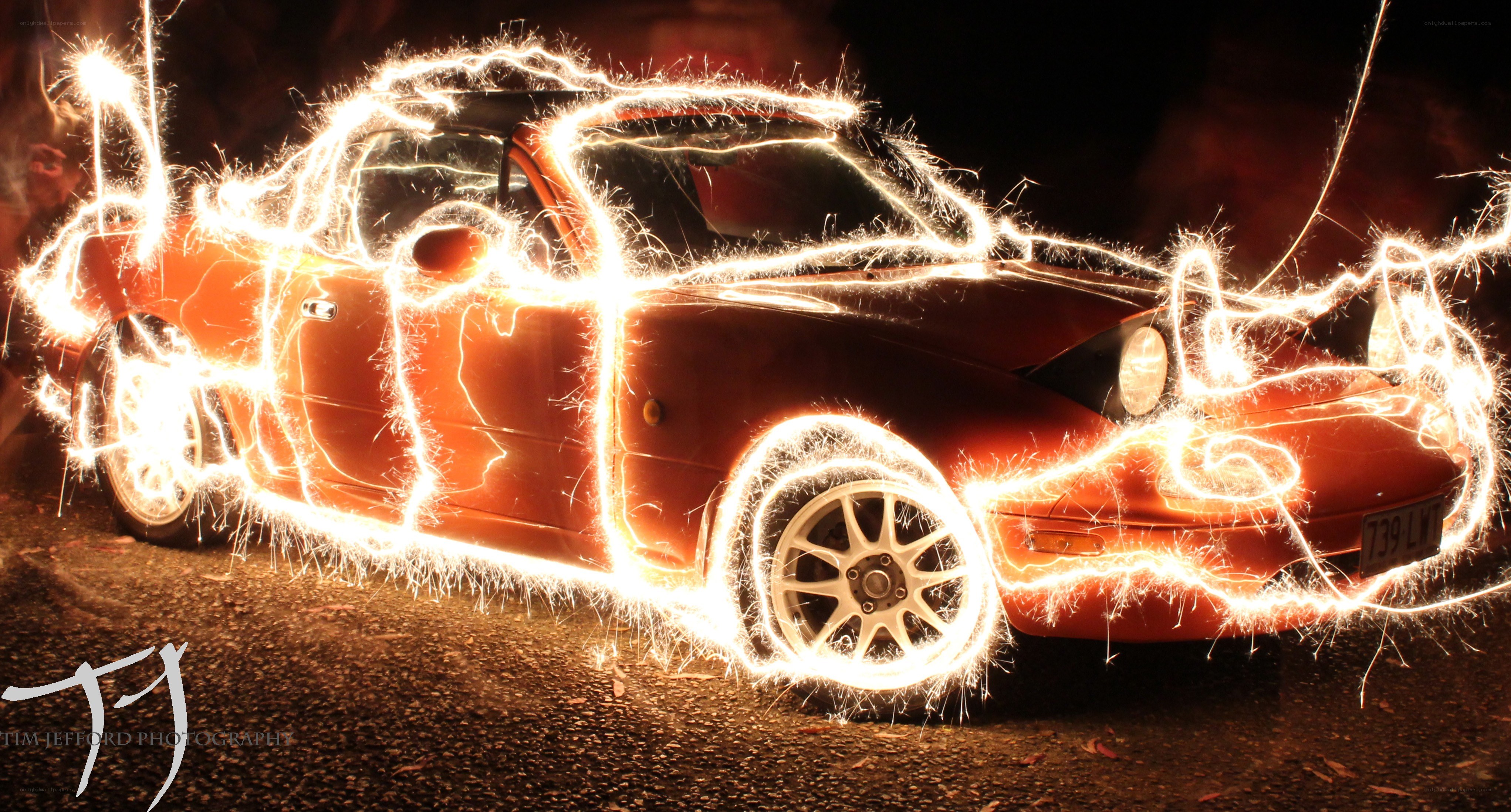 Car with sparkler light painting