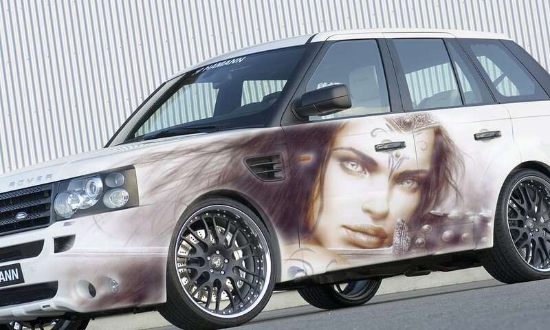 car with woman's face wrap