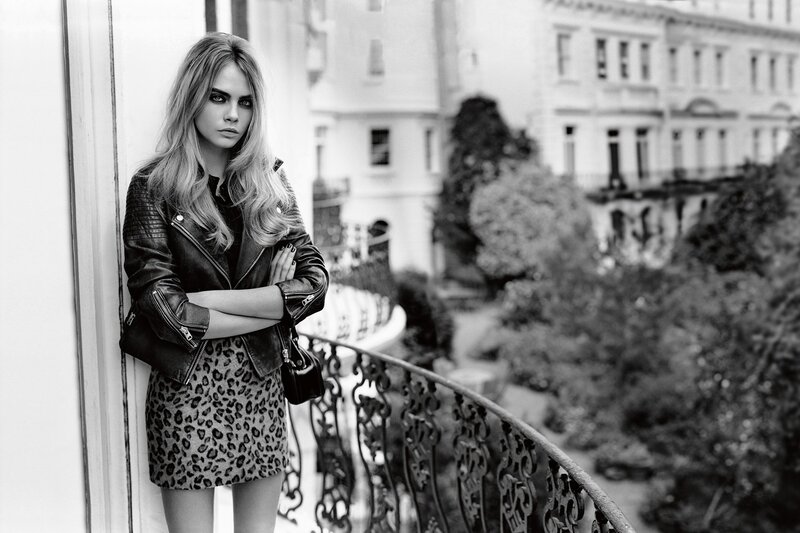Cara Delevingne on a balcony
