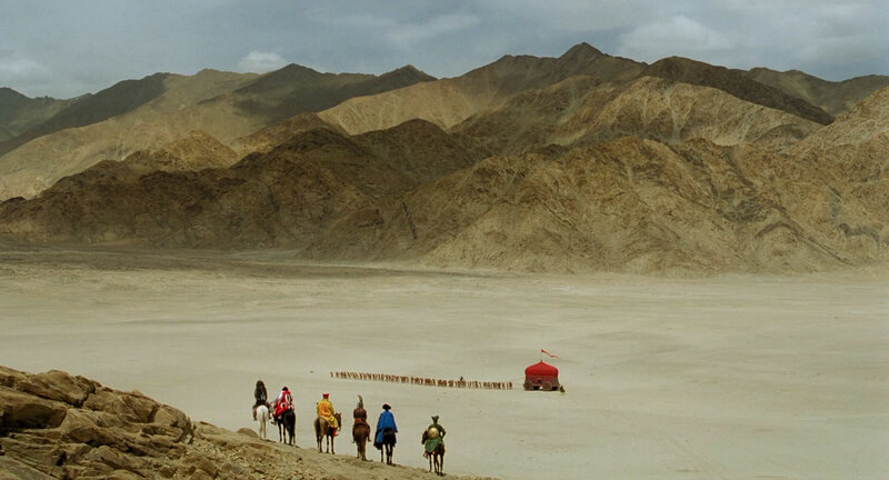 Caravan in desert landscape