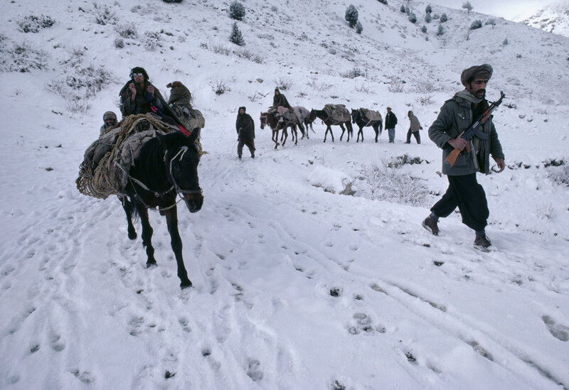 Caravan in snowy mountains