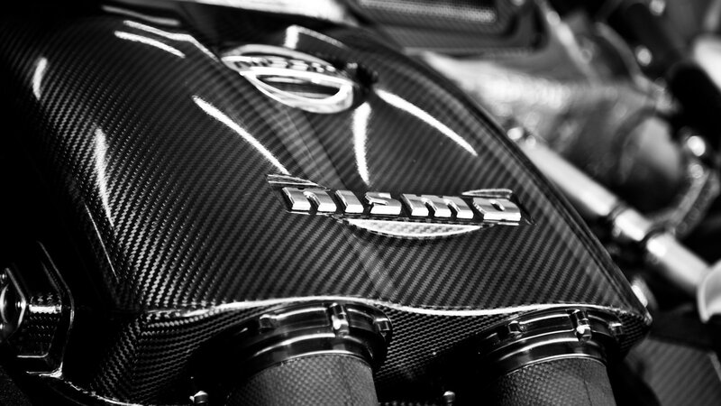 Carbon Fiber Engine Cover — Black, Dramatic, Photograph