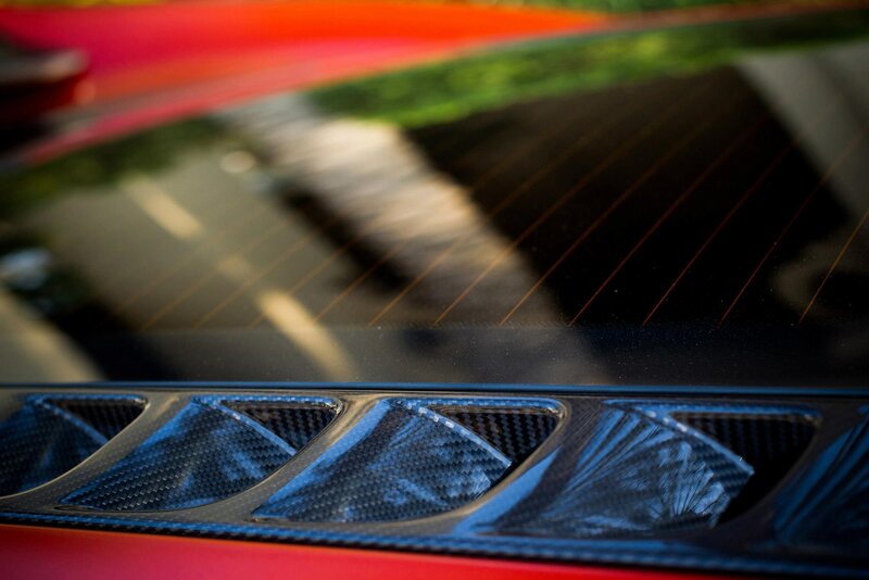 Carbon fiber vents on red car