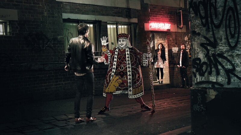 Card King Figure on Street