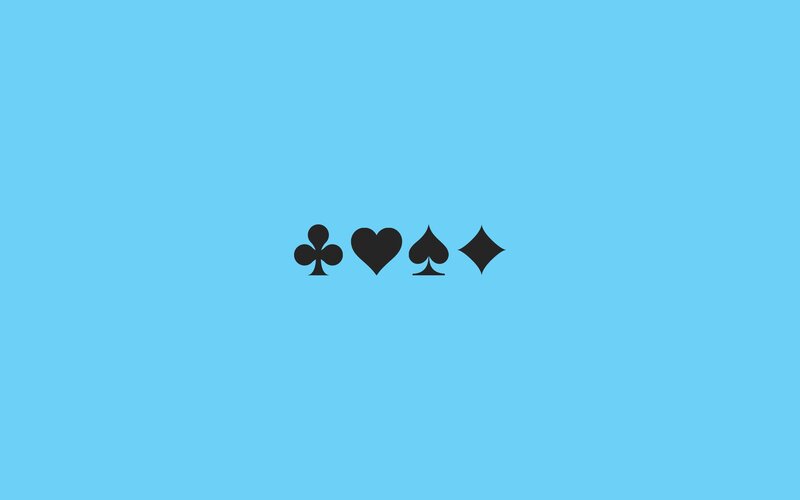 card suit symbols on blue