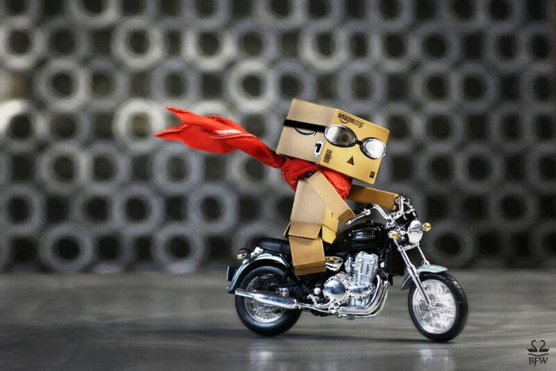 Cardboard Box Character on Motorcycle