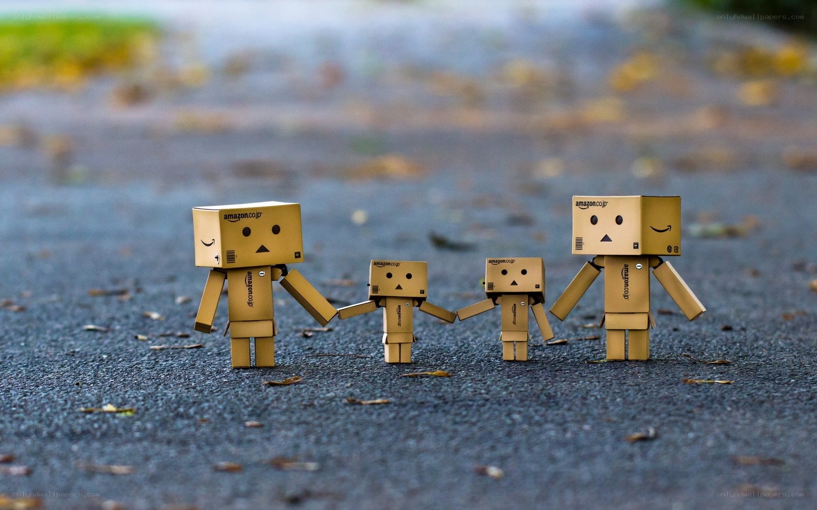 Cardboard box family walking
