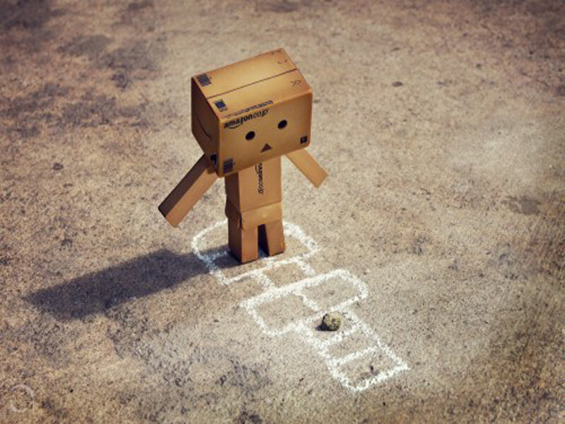 Cardboard Box Figure — Brown, Playful