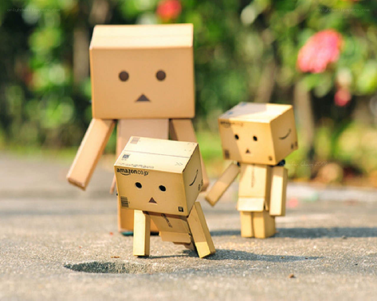 Cardboard box figures in garden