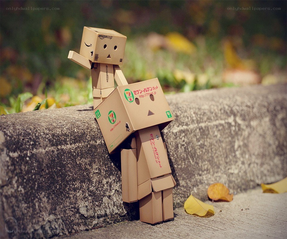 cardboard box figures on wall