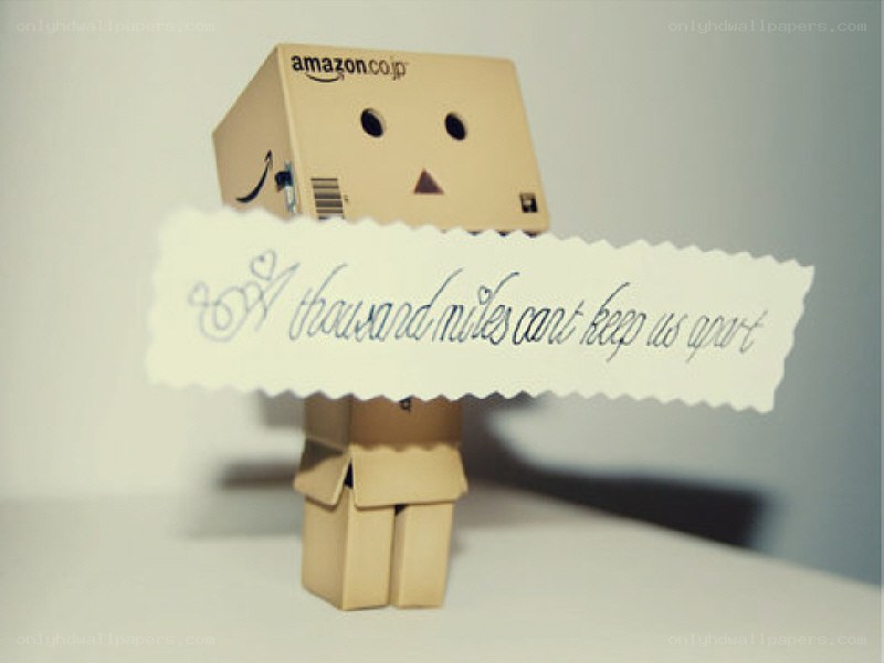 cardboard box robot with sign