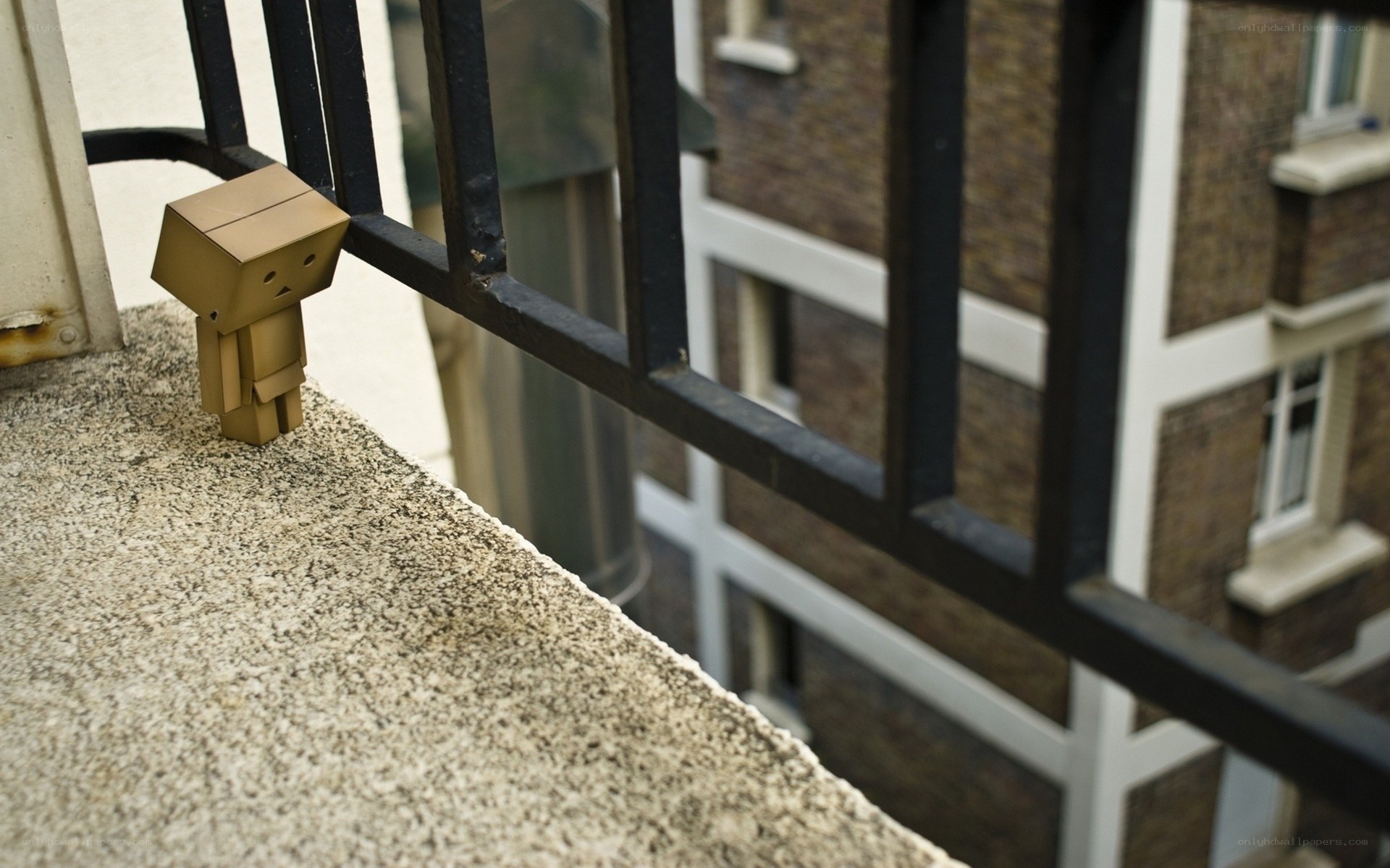 cardboard figure on balcony